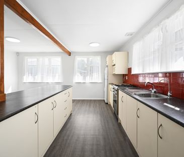 This charming 2-bedroom home with an additional sleepout is ideally... - Photo 6