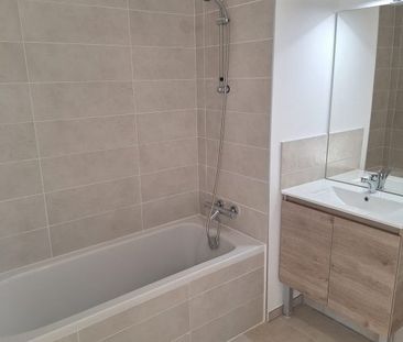 T4 NEUF AVEC LOGGIA + PARKINGS - Photo 5