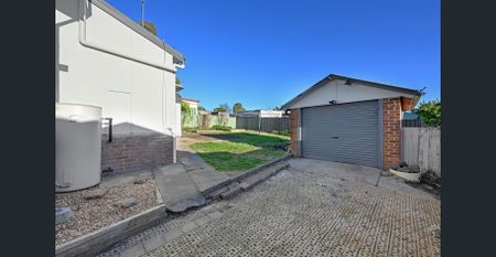 Stylish Renovation with Indoor Comfort and Outdoor Charm - Photo 5