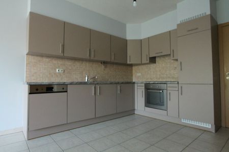 Gelijkvloers appartement met 1 slaapkamer - ondergrondse staanplaats en kelderberging - Photo 4