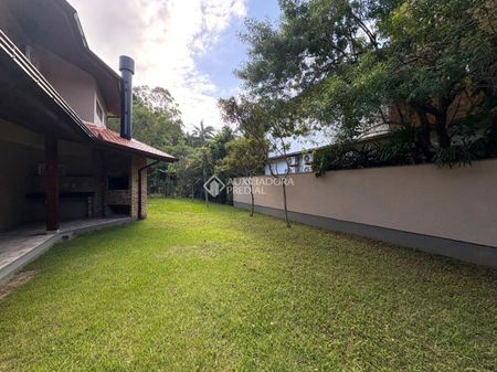 Casa em Condomínio com 4 quartos e 490m² para alugar em Rio Tavares, Florianópolis. - Photo 3