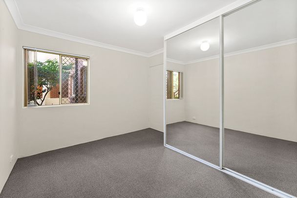 Elevated Ground Floor Two Bedroom Unit - Photo 1