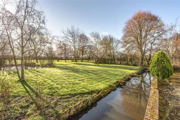 A charming and characterful home set in beautiful gardens with views across open countryside - Photo 1