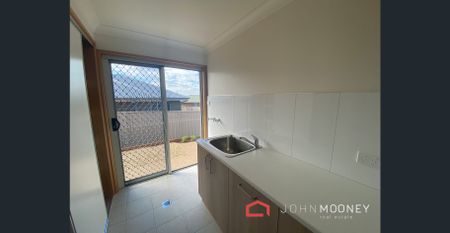 This brand-new home is ready to move straight in and features: - Photo 3