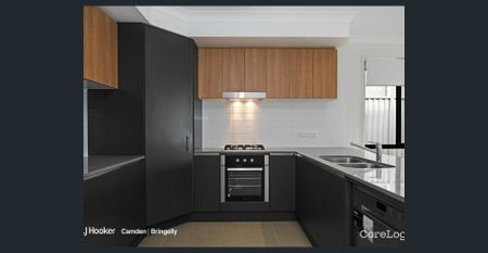 Modern Family Home in the Heart of Gregory Hills - Photo 3