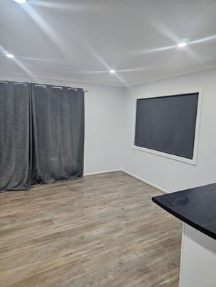 Freshly Updated Home in a Convenient Coastal Location - Photo 1