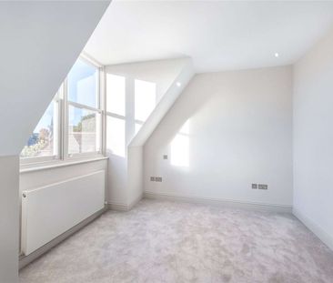 Stunning two bedroom, two bathroom top floor apartment set in a con... - Photo 3