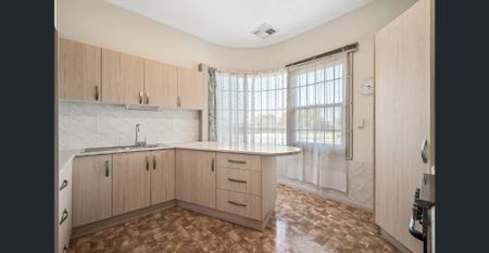 Classic Charm with Modern Comforts in a Prime Location - Photo 3