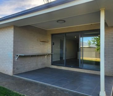 Beautiful 4-Bedroom Family Home with Outdoor Entertaining Area in a... - Photo 1