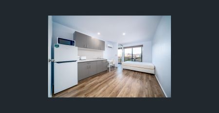 ROOM FOR RENT- Spacious Rooming House Private Room with Cozy Communal Space! - Photo 3