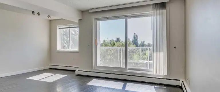 3 Bedroom 1.5 Bath with insuite laundry and open concept kitchen | 202D - 4455 Greenview Dr NE, Calgary - Photo 1