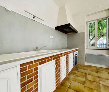 Appartement T3 de 70.39m² rez-de-chaussée en centre ville - Photo 3