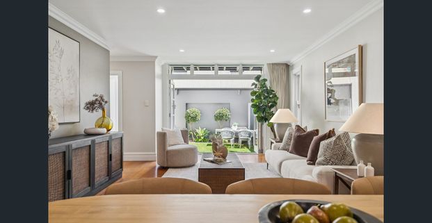 Freestanding brick home with timeless character façade - Photo 1