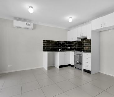 Cozy and Well-Maintained 2-Bedroom Home - Photo 3