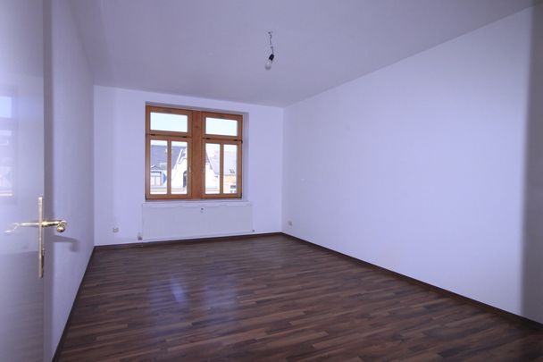 Tolle Dachgeschosswohnung mit großem Balkon - Foto 1