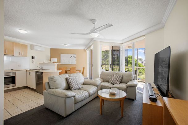 Fully Furnished Coastal Apartment with Private Rooftop Spa and Resort-Style Living - Photo 1