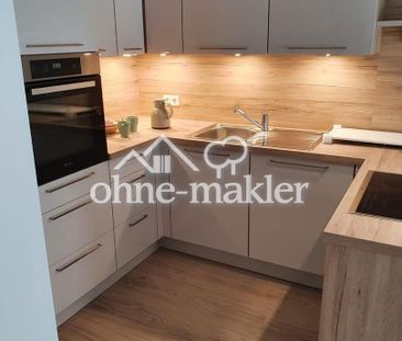 Moderne 3-Zimmer-Wohnung mit Garten und Tiefgarage - Photo 1