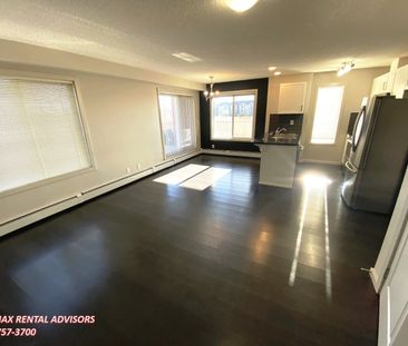 SPACIOUS 2 BED, 2 BATH TOP FLOOR APARTMENT WITH 2 U/G PARKING STALL... - Photo 3