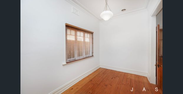 Three Bedroom Home in Prime Location - Photo 1