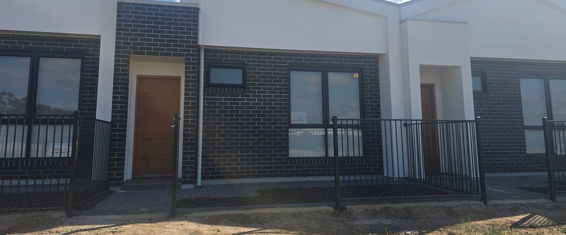 Brand-new, stylish, and perfectly located! - Photo 1