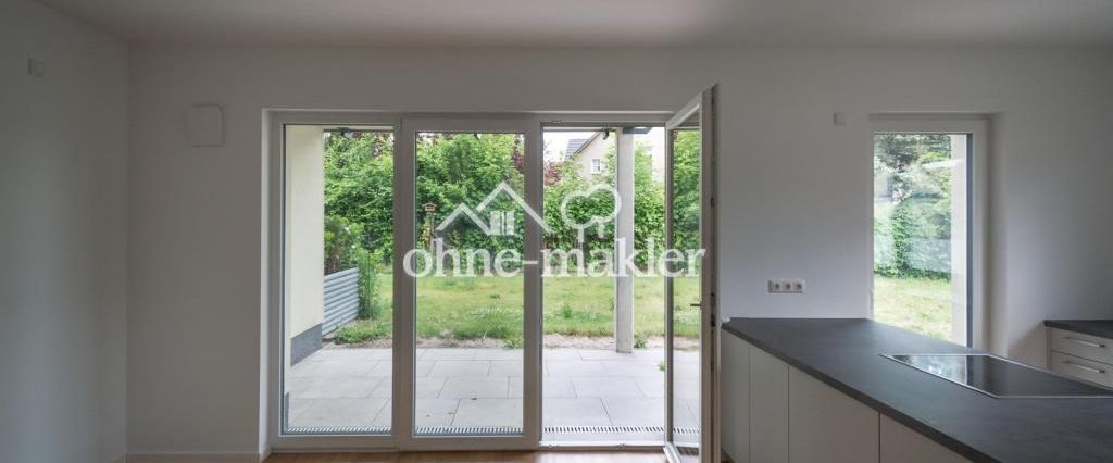 Schwellenlose Wohnung mit Terrasse und Garten - Photo 1