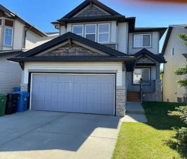 Fabulous 2 story walk-out home in the desirable springbank hill com... - Photo 1