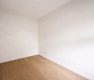 Move-In Ready | Renovated Duplex with 3 Bedrooms - Photo 1