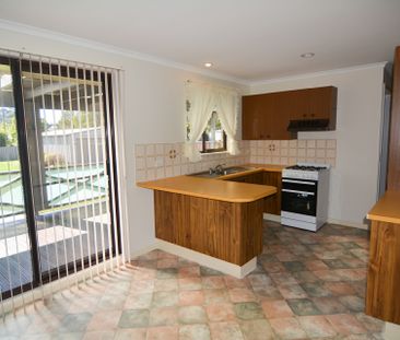 NEAT FAMILY HOME - Photo 1