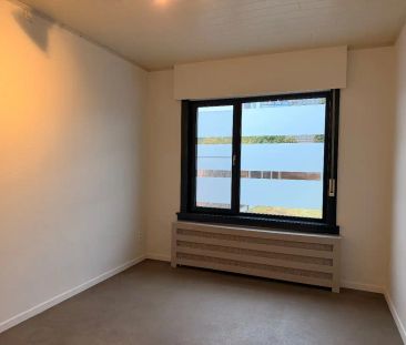 Verzorgd gelijkvloers appartement met tuin - Photo 3