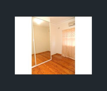 Spacious Family Home with Great Outdoor Living in Lurnea - Photo 3