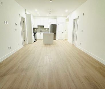 New Condo in Surrey – Top Floor! - Photo 1