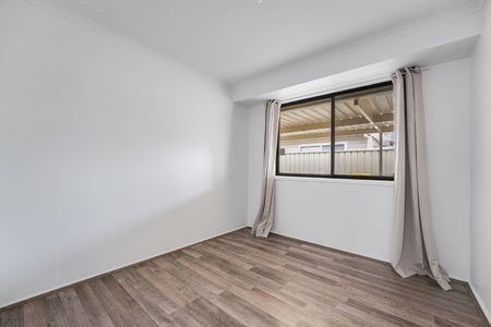 Four Bedroom Home with Spacious Entertaining Area - Photo 4