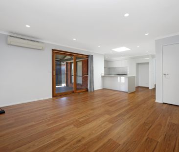 Spacious Family Home with Expansive Backyard - Photo 1