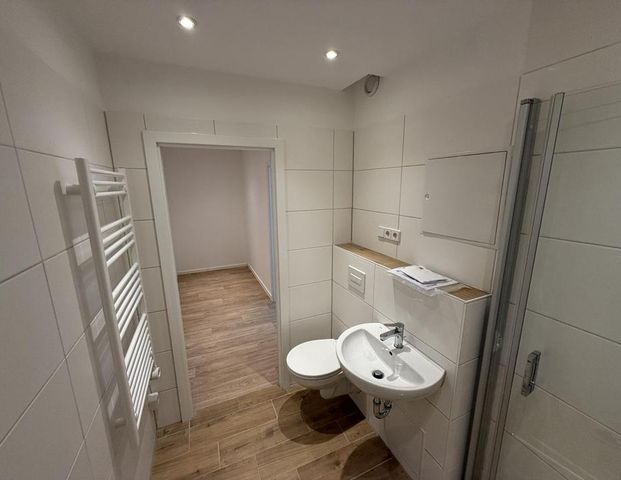 Moderne barrierearme 1-Raumwohnung mit ebenerdiger Dusche - Foto 1