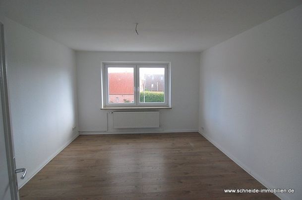 Geräumige 2-Zimmer-1.OG-Wohnung mit Wohnküche und Balkon - Foto 1