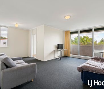 Relaxed Riverside Living with Balcony Views - Photo 6