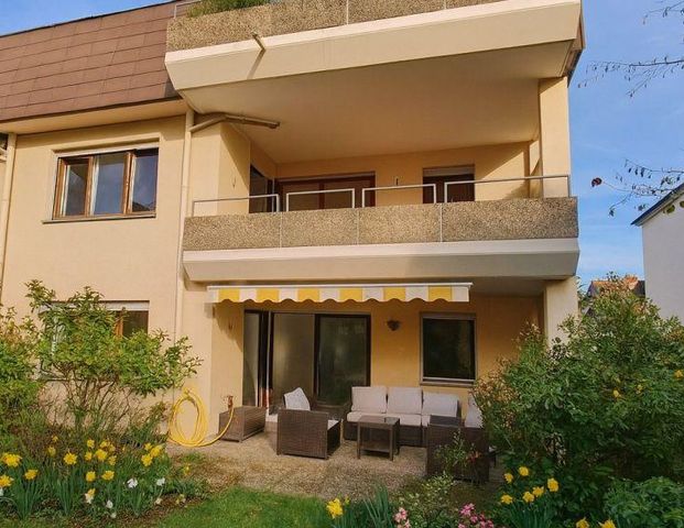 Erdgeschosswohnung mit Terrasse und Garten - Foto 1