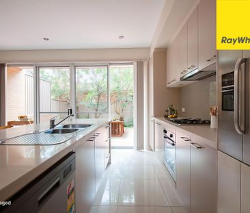 CONTEMPORARY THREE BEDROOM TOWNHOUSE IN MOST SOUGHT AFTER LOCATION - Photo 4