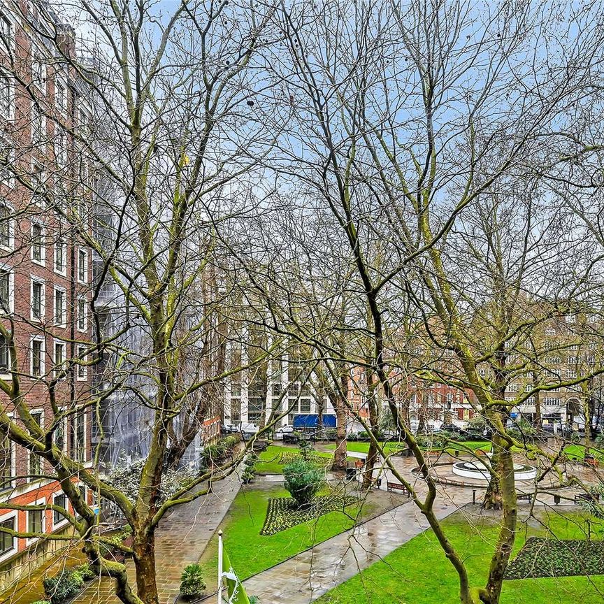 Contemporary 1 bedroom apartment, overlooking a pretty garden square, in a well maintained modern building with 24/7 concierge. - Photo 1