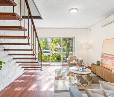 Charming Two-Storey Townhouse in a Peaceful Eastern Suburb Setting! - Photo 5