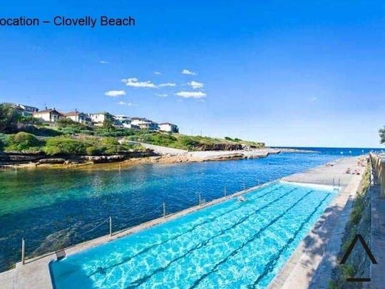 Executive Top-Floor Apartment with Ocean/District Views - Photo 1