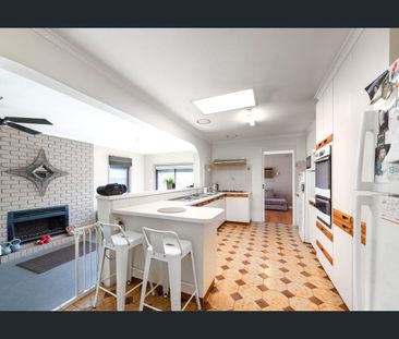 Spacious Four-Bedroom Family Home with Multiple Living Areas! - Photo 6
