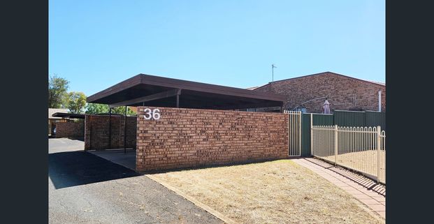 Comfortable Two-Bedroom Unit With A Courtyard - Photo 1