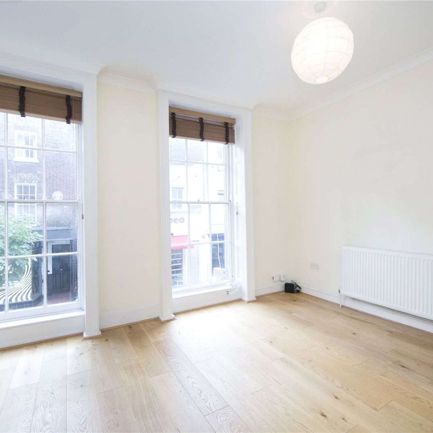 A spacious two bedroom split level flat on Exmouth Market - Photo 1