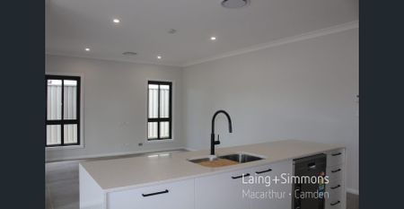 Brand New - 4 Bedroom + Multiple Living Areas + Large Yard - Photo 5