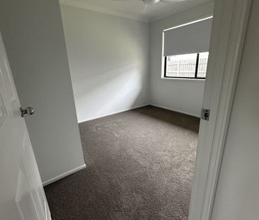 Spacious Family Home with Multiple Living Areas - Photo 3