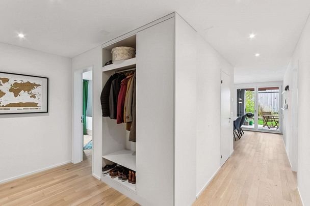 Moderne und lichtdurchflutete 4.5-Zimmer-Wohnung mit Gartenfläche - Foto 1