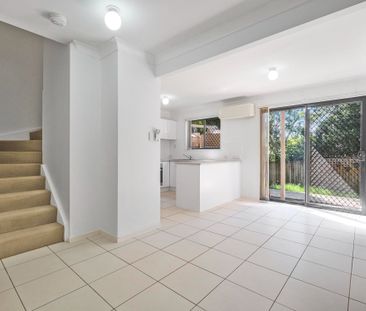 Spacious 3-Bedroom Townhouse with Extra Driveway Parking & Air-Cond... - Photo 1