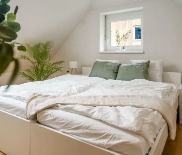 Charmante Dachgeschosswohnung in ruhiger Lage - Photo 4