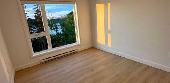 Magnifique grand 4-1/2 vue sur le fleuve avec accès rapide aux ponts - Photo 2